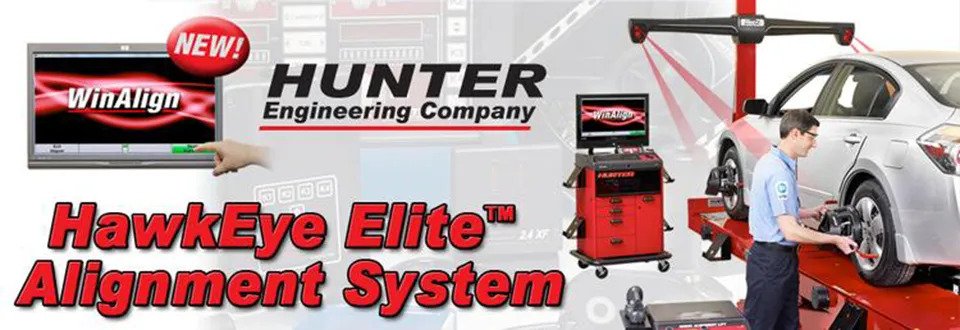 21-1920w A mechanic uses the Hunter HawkEye Elite Alignment System to check a cars wheels. Equipment, a screen, and the WinAlign logo are visible, promoting Hunter Engineering Company.