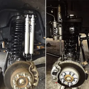 gallery-ing-two Side-by-side comparison of two vehicle suspension systems, both with large coil springs and FOX shock absorbers installed near brake discs and wheel hubs. The left suspension has dual shocks; the right has a single shock with a remote reservoir.
